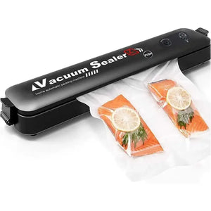 Vacuum sealer machine sealing salmon fillets with lemon in plastic bags