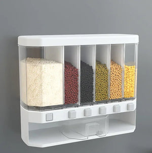 Wall-mounted plastic food dispenser with five compartments holding rice and colorful beans