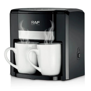 RAF coffee maker brewing two cups with steam, black countertop appliance