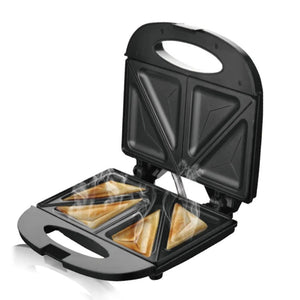 Electric sandwich maker with four hot toasted sandwiches and steam rising