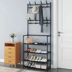 Entryway shoe rack with hooks for coats, hats, bags, and adjacent wooden cabinet