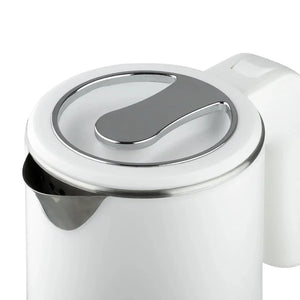 Modern white electric kettle with stainless steel lid and spout close-up