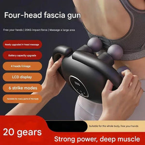 Four-head fascia massage gun with LCD display used on a woman's back, highlighting deep muscle massage and strong power.