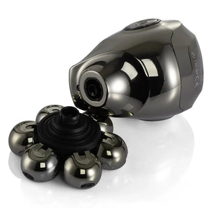 Electric head shaver with detachable rotary blade on white background