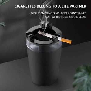 Black smokeless ashtray with a lit cigarette indoors, modern minimal design, clean home accessory