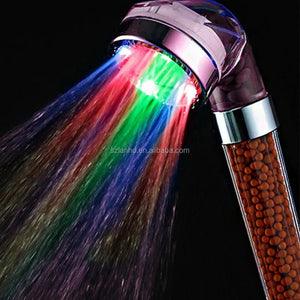 LED shower head with water filter beads, spraying colorful lighted water streams