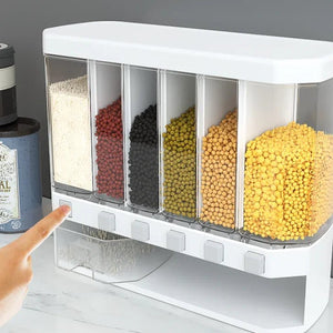 Multi-compartment cereal dispenser filled with assorted grains on a kitchen countertop