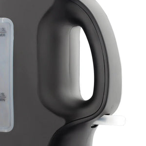 Close-up of black electric kettle handle and water level indicator