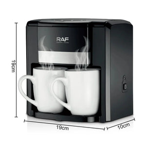 RAF compact black coffee maker with two steaming white cups, size 19x19x10cm