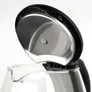 Close-up of open electric glass kettle lid with stainless steel interior