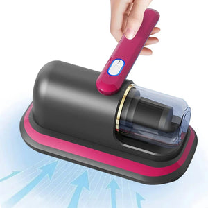 Hand using portable vacuum cleaner with pink accents on white background