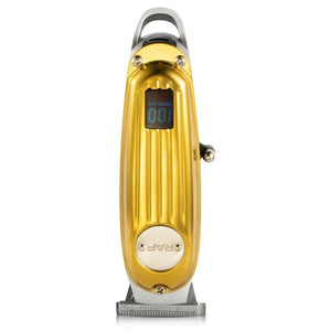 Gold electric hair clipper with digital display on white background