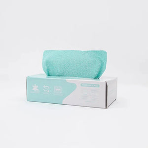 Aqua microfiber cleaning cloth on a white and teal removable rag box, isolated background