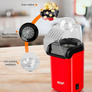 Red RAF popcorn maker with transparent lid, measuring spoon, and nonstick coated interior.