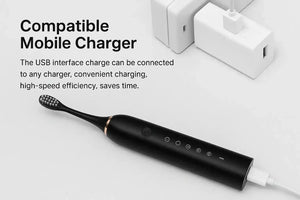 Black electric toothbrush with USB charging, compatible charger adapters on white surface