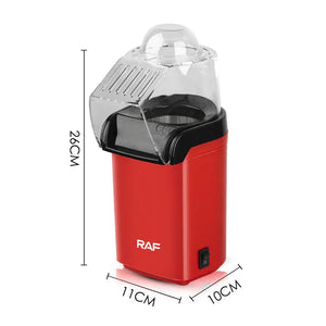 Red RAF popcorn maker with transparent lid, showing dimensions 26cm x 11cm x 10cm