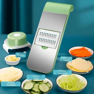 Vegetable slicer mandoline with multiple blade options and sliced vegetables on plates