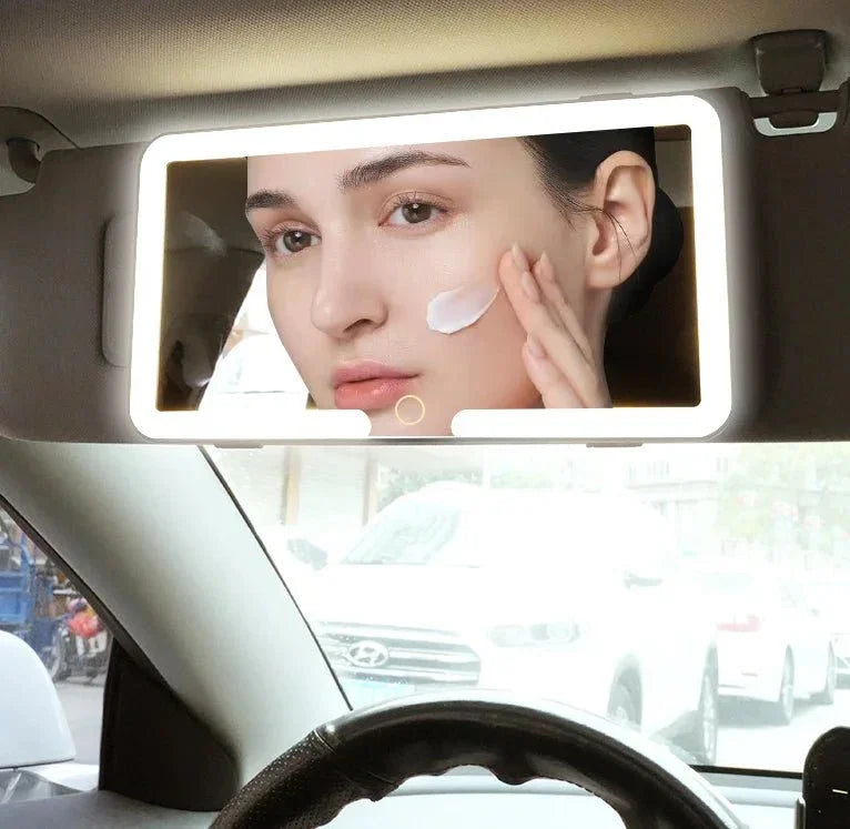 LED car visor vanity mirror with woman applying cream on her face