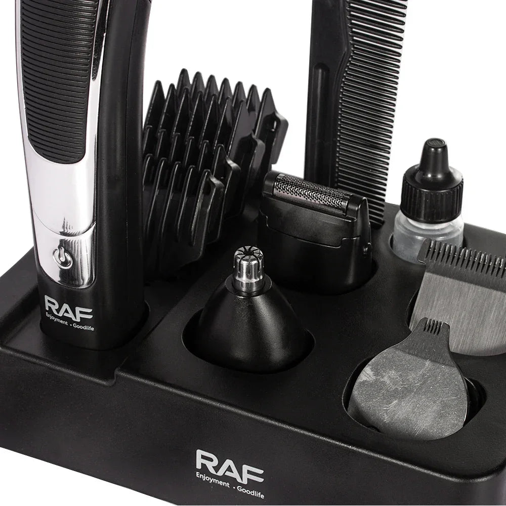 RAF grooming kit with hair trimmer, comb, blade attachments, and cleaning oil on stand