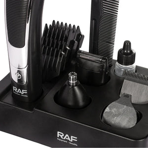 RAF grooming kit with hair trimmer, comb, blade attachments, and cleaning oil on stand