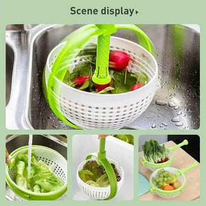 Vegetable strainer basket with green handle draining lettuce, radishes, grapes, and greens in sink.